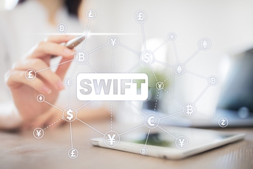 SWIFT, Chine, monnaie, blockchain